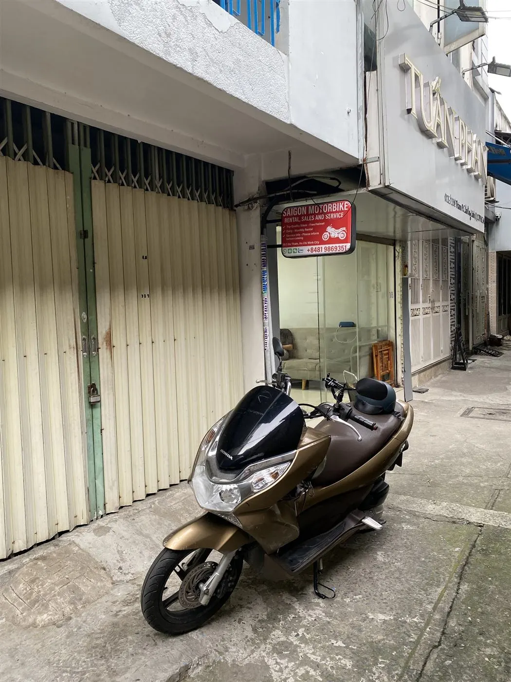 Honda PCX outside the shop